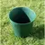 Flower pot made of meadow grass and plastic in marble look
